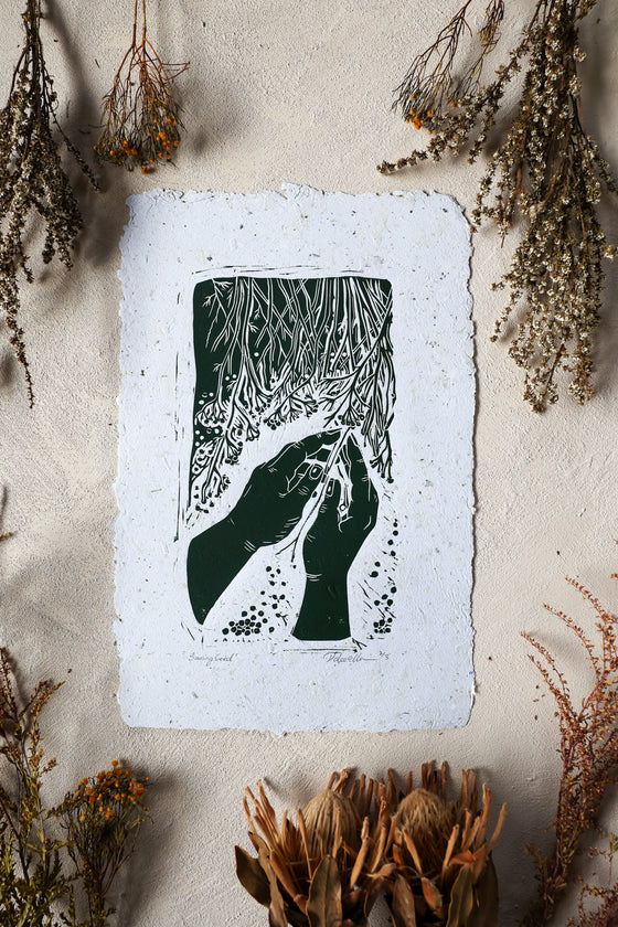 Saving seed -  Handmade lino print on nettle infused recycled paper